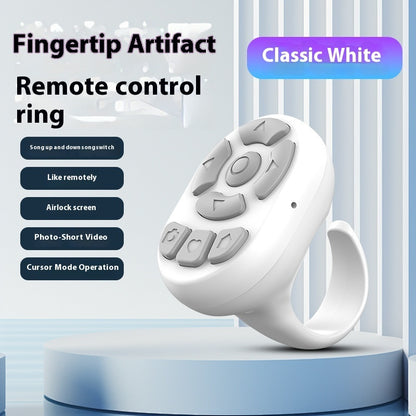 White remote control ring with buttons on a light blue background
