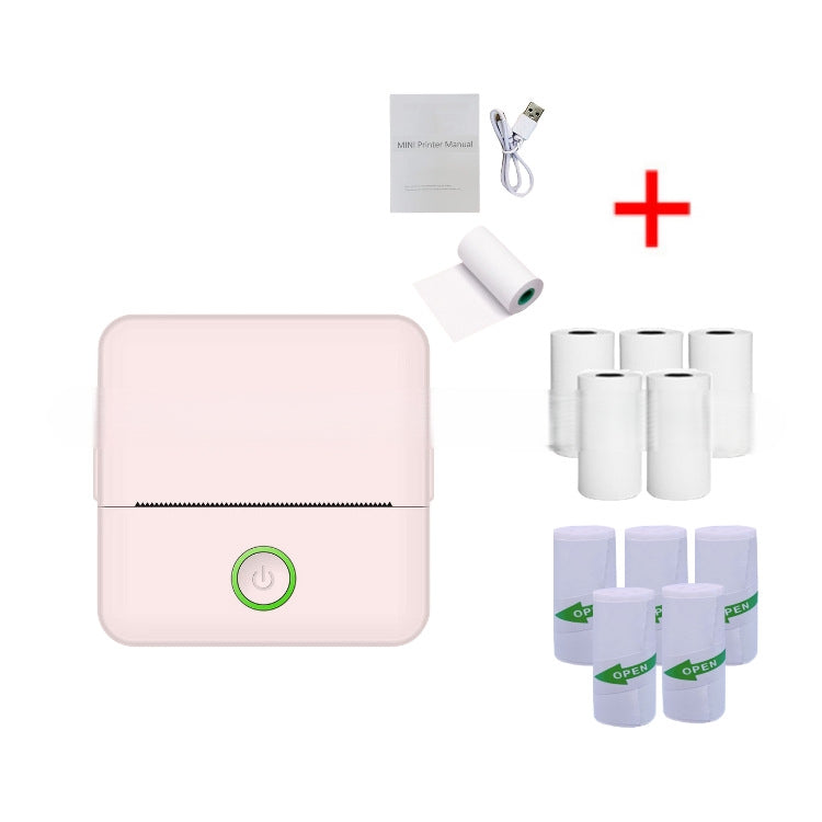 Pink portable printer with paper rolls and accessories on a white background