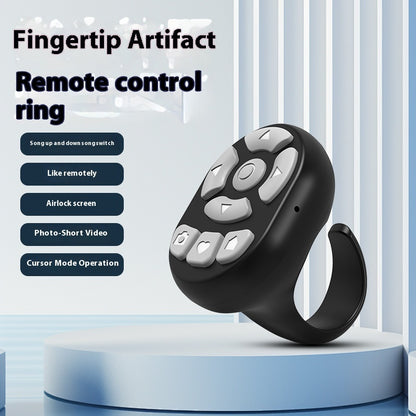 Black remote control ring with gray buttons on a white background