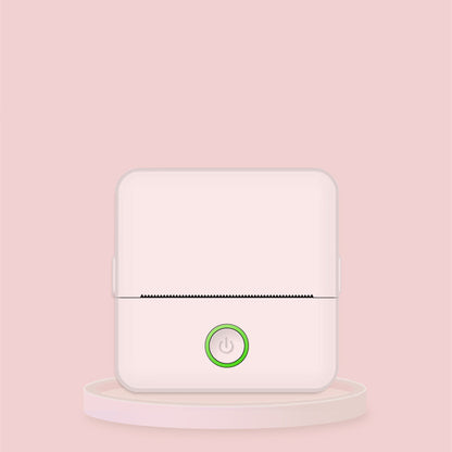 White electronic device with a green power symbol on a pink background
