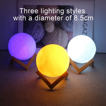 Three spherical lamps with different lighting colors on stands, with text indicating their diameter.