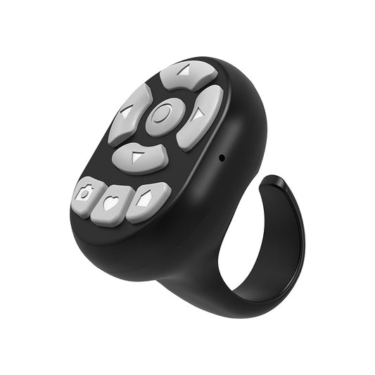 Black remote control ring with gray buttons on a white background